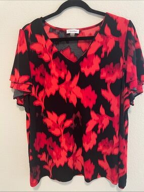Calvin Klein Black Blouse with Vivid Red Floral Pattern